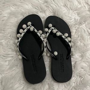 cute black mystique flip flops with white balls